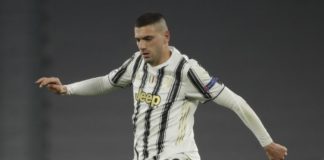 Juventus' Merih Demiral controls the ball during the Champions League, round of 8, second-leg soccer match between Juventus and Porto at the Allianz stadium in Turin, Italy, Tuesday , March 9, 2021. (AP Photo/Luca Bruno)