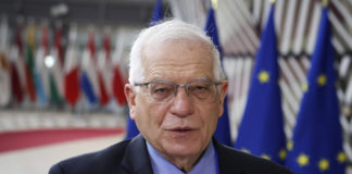 European Union foreign policy chief Josep Borrell speaks to the media as he arrives for a meeting of EU foreign ministers at the European Council building in Brussels, Monday, March 22, 2021. (Aris Oikonomou, Pool via AP)