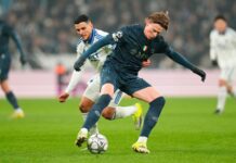 FC Copenhagen's Mohamed Elyounoussi, left, and Napoli's Scott McTominay battle for the ball during the Champions League group stage soccer match between FC Copenhagen and Napoli in Copenhagen, Tuesday, Jan. 20, 2026. (Liselotte Sabroe/Ritzau Scanpix via AP)
