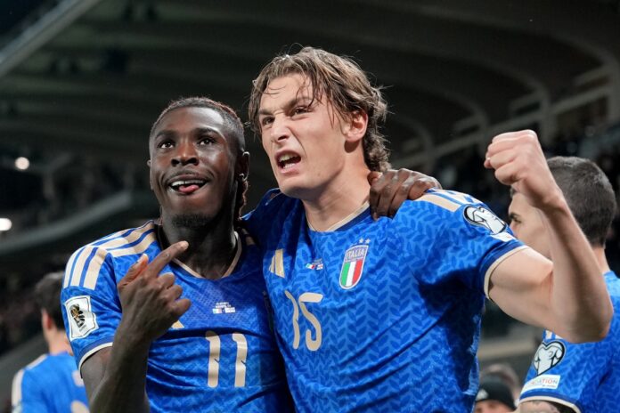 Italy’s Moise Kean celebrates after scoring 2-0 with Pio Esposito during the World Cup 2026 qualifying play-off soccer match between Italy vs Northern Ireland at the New Balance Stadium in Bergamo, north Italy - Thursday, March 26 , 2026. Sport - Soccer . (Photo by Spada/LaPresse)